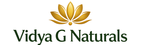 Vidya G Naturals logo with a gold lotus flower on a white background